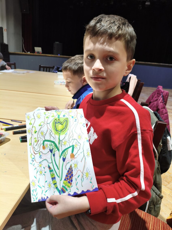 Mural integracyjny na płocie przy KOK-u